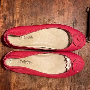 Cute Michael Kors size 7 1/2 red leather flats. Worn only a few times.